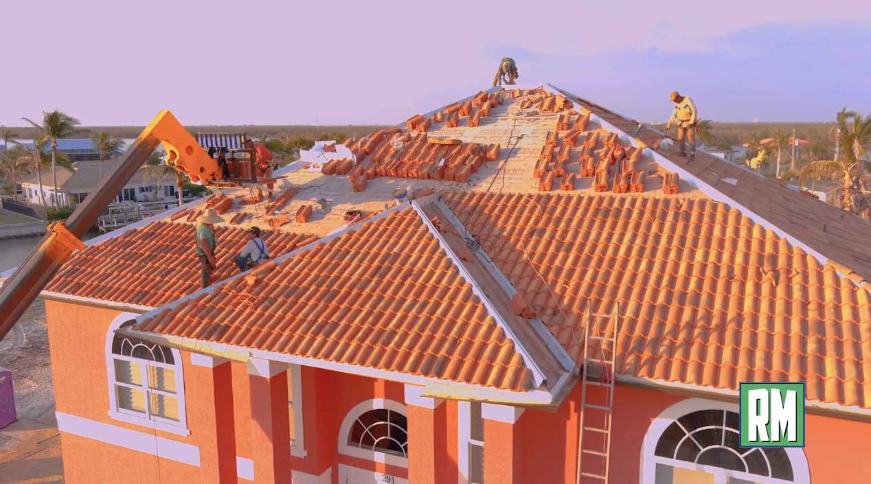 A building with orange tiles on the roof